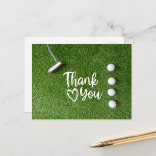Golf Putter sind auf grünem Gras Danke Postkarte