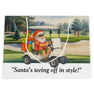 Golf-Weihnachts-Santa fährt Golfwagen auf dem Plat Große Geschenktüte
