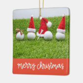 Golf Weihnachtsgeschenke mit Ball und Tee auf grün Keramikornament (Links)