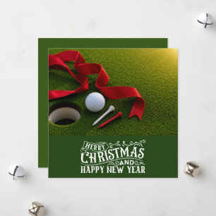 Golf-Weihnachtsmotiv mit Golfball auf Grün Feiertagskarte