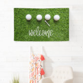 Golf Willkommensschild mit Golfball auf grünem Gra Banner (Insitu)