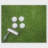 Golfball auf grünem Gras  Geschenkpapier (Flach)