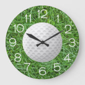 Golfball auf grünem Gras Große Wanduhr (Vorderseite)