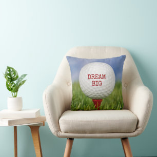 Golfball auf rotem Tee mit Zitat Kissen