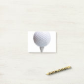 Golfball auf weißer post-it klebezettel (Auf Schreibtisch)