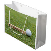 Golfball mit dem Text Danke auf grünem Gras Große Geschenktüte (Vorderseite Schrägansicht)