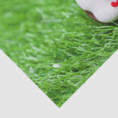 Golfball mit dem Weihnachtsmann auf grüner Weihnac Seidenpapier (Detail)