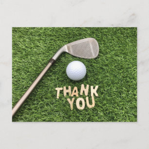 Golfball mit dem Wort „Danke“ auf grünem Gras Postkarte