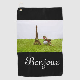 Golfball mit Eiffelturm auf grünem Bonjour Golfhandtuch