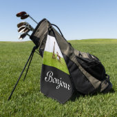 Golfball mit Eiffelturm auf grünem Bonjour Golfhandtuch (Gras)