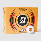 Golfball mit Golfernamen und orangefarbenen Initia (Verpackungen)