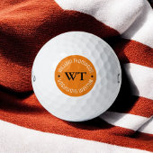 Golfball mit Namen ( orangefarbenes Kreismonogramm