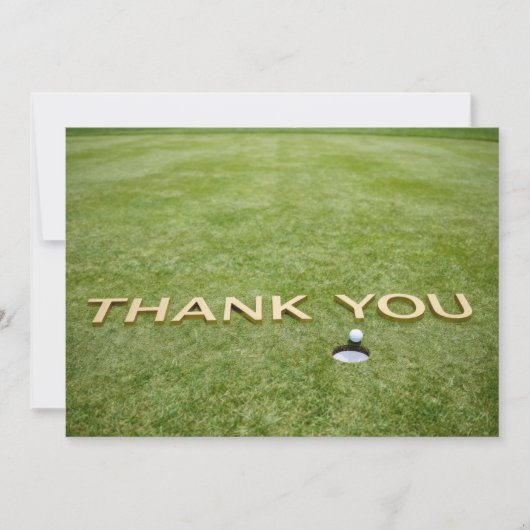 Golfball mit Text Danke auf grünem Gras (Vorderseite)