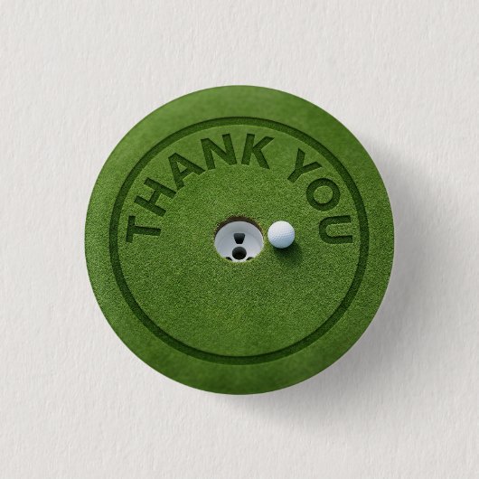 Golfball mit Text Danke auf grünem Gras Button (Vorderseite)