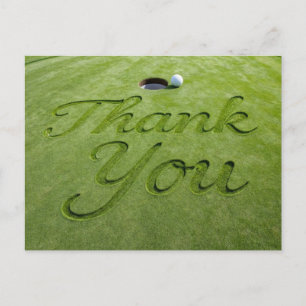 Golfball mit Text Danke auf grünem Gras Postkarte
