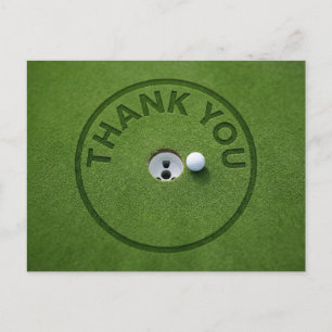 Golfball mit Text Danke auf grünem Gras Postkarte
