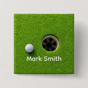 Golfball neben Loch auf grünem Rasen Golfplatz Button