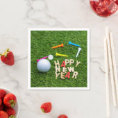 Golfball und Tee mit Happy New Year auf grün Serviette (Beispiel)