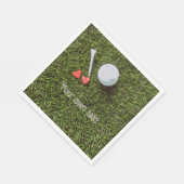 Golfball und Tee mit Liebe auf dem grünen Golfplat Serviette (Ecke)