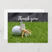 Golfball und Tee sind auf grünem Gras Vielen Dank Postkarte (Vorne/Hinten)