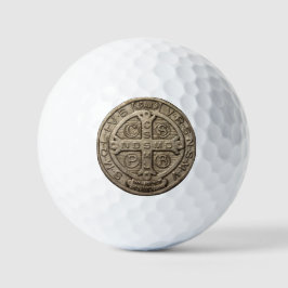 Golfbälle mit der Medaille des Heiligen Benedikt