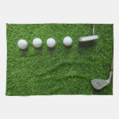 Golfbälle sind auf grünem Gras Geschirrtuch (Horizontal)