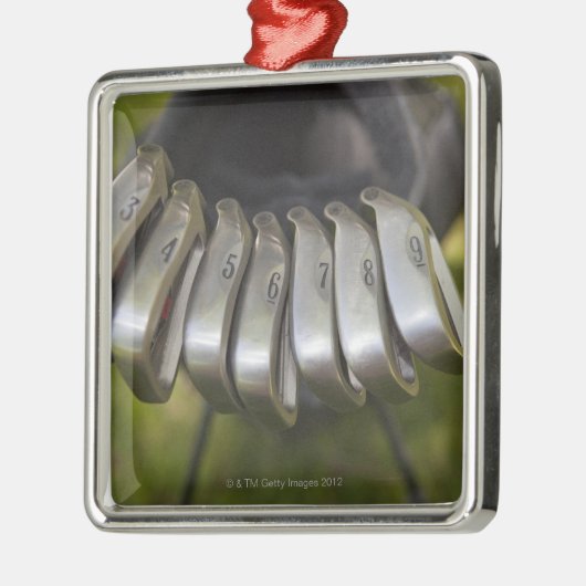 Golfclubköpfe in einer Tasche. Drei bis neun Silbernes Ornament (Links)