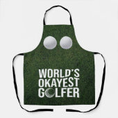 Golfschläger liegen auf grünem Gras Schürze (Vorderseite)