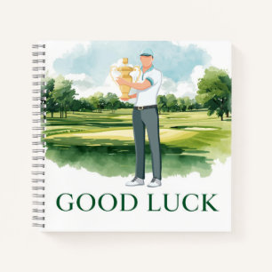 Golfspieler auf Fairway mit Text Viel Glück Notizblock