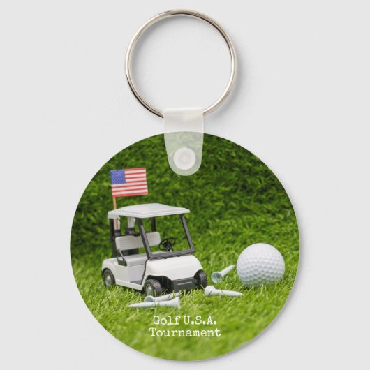 Golfwagen und Ball mit der Flagge Amerikas Schlüsselanhänger (Vorderseite)