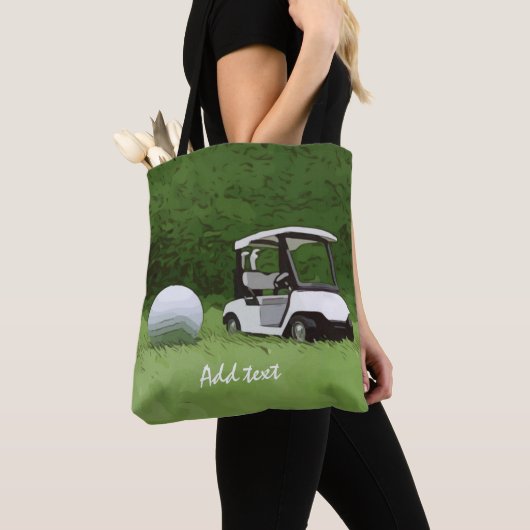 Golfwagen und Golfball auf grünem Gras Golfer Tasche (Von Nahem)