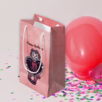 Gothic-Rag-Puppe mit schwarzem Herz am rosa Geburt