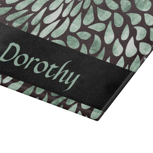 Gradient grüne Blätter auf schwarz Schneidebrett (Ecke)