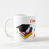 Graduiertenkap und Bücher Glückwunsch Kaffeetasse (Links)