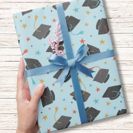 Graduierungskappe und Tassel auf hellblau Geschenkpapier