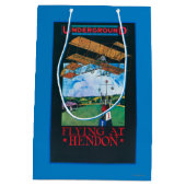 Grahame-Weiß und Flugzeug über Flughafen-Plakat Mittlere Geschenktüte (Rückseite)