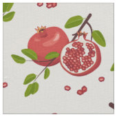 Granatäpfel auf weißen Baumwollstoffen oder Polyes Stoff (Nahaufnahme)