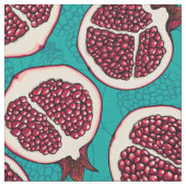 Granatscheiben auf Türkis Stoff (Nahaufnahme)