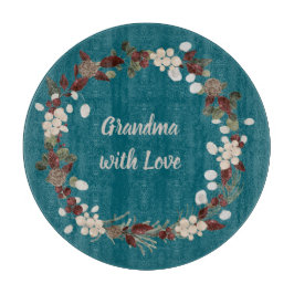 Grandma Christmas wreath on a rich teal  Schneidebrett