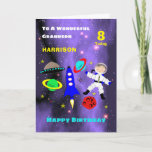 Grandson Spaceship Astronaut Niedlich Happy Birthd Karte<br><div class="desc">Super niedlicher Cartoon Weltraummotiv mit Astronaut im Weltraum,  Rakete,  Sterne,  Planeten und Raumschiff; So ein lustiges und farbenfrohes Design und einfach zu anpassen mit einem Namen,  Alter und Nachricht,  für diese besondere Touch ohne Aufpreis.</div>