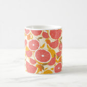 Grapefruit und halbierte Scheiben mit Blätter auf Kaffeetasse (Mittel)