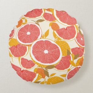 Grapefruit und halbierte Scheiben mit Blätter auf Rundes Kissen