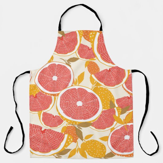 Grapefruit und halbierte Scheiben mit Blätter auf Schürze (Vorderseite)