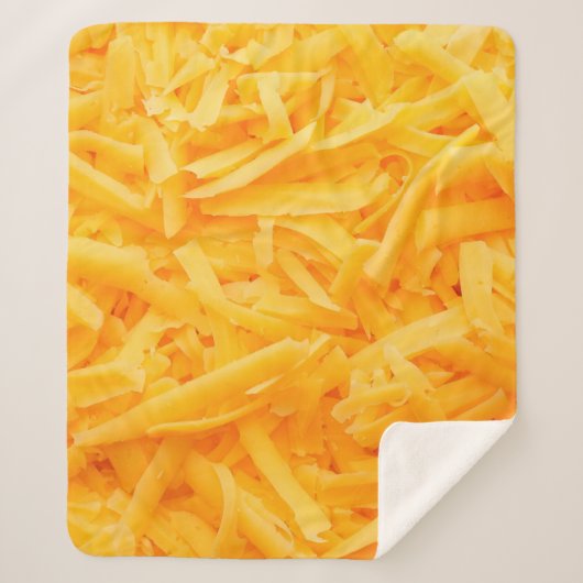 grated cheddar cheese top view sherpadecke (Vorderseite)