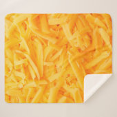 grated cheddar cheese top view sherpadecke (Vorderseite (Horizontal))