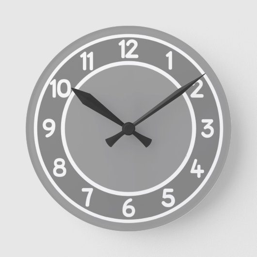 Grau und Weiß auf einer beliebigen Uhr der Hinterg (Vorderseite)