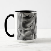 Graue, abgerundete Formen, in hellen Tönen Tasse (Links)