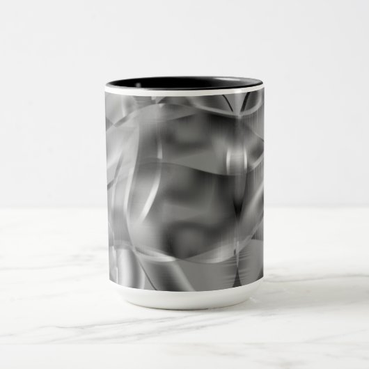 Graue, abgerundete Formen, in hellen Tönen Tasse (Zentrum)