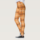 Graue bis braune Kreise über orangefarbene, quadra Leggings (Links)