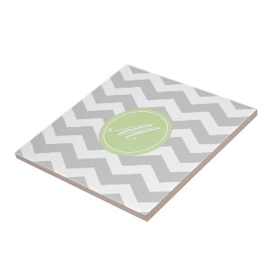 Graue Chevronfliesen mit Monogramm Fliese
